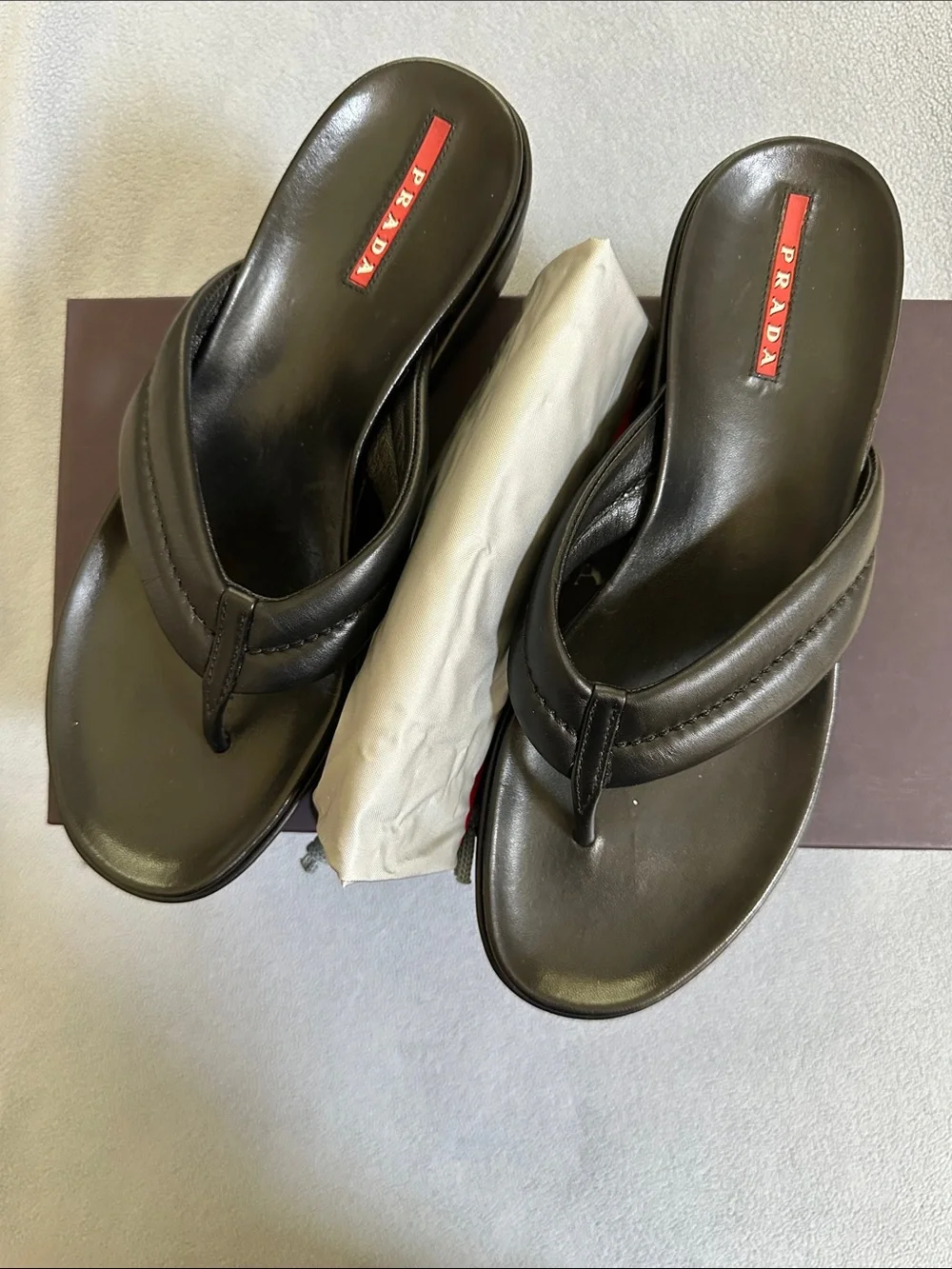 Prada Black Leather Ladies Thong Sandals with Red Logo, dust bag, Size 38. US 8